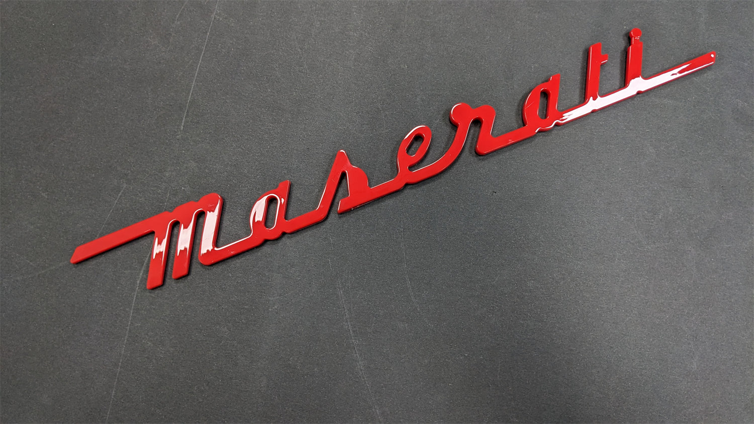 Maserati Quattroporte GranTurismo-Maserati Rear Emblems Script Gloss Red 673001404 Italiaspares