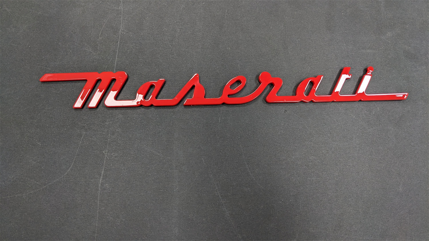 Maserati Quattroporte GranTurismo-Maserati Rear Emblems Script Gloss Red 673001404 Italiaspares