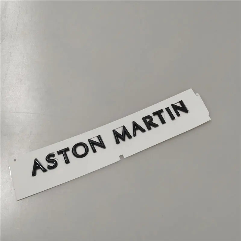 Aston Martin Script Badge Rear Emblem Glossy Black Factory