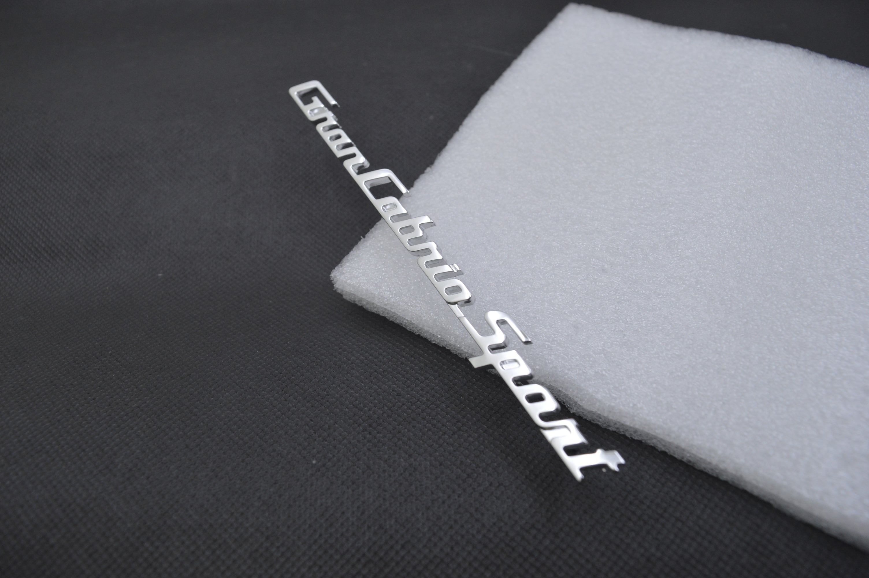 Genuine Maserati GranCabrio Sport Dashoard Emblem # 84180800 Factory