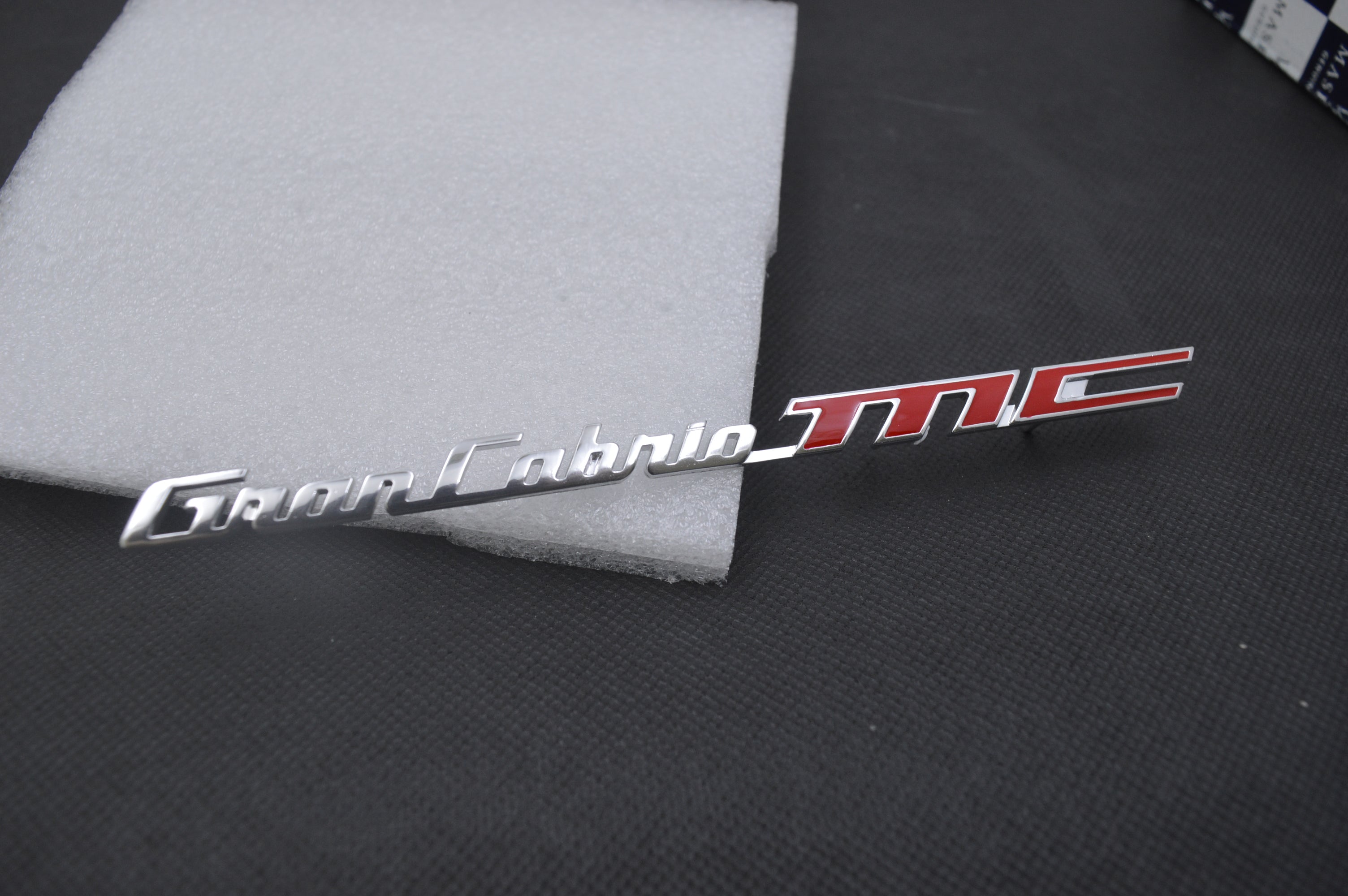 Genuine Maserati GranCabrio MC Interior Marker Side badge emblem # 85190400 Factory