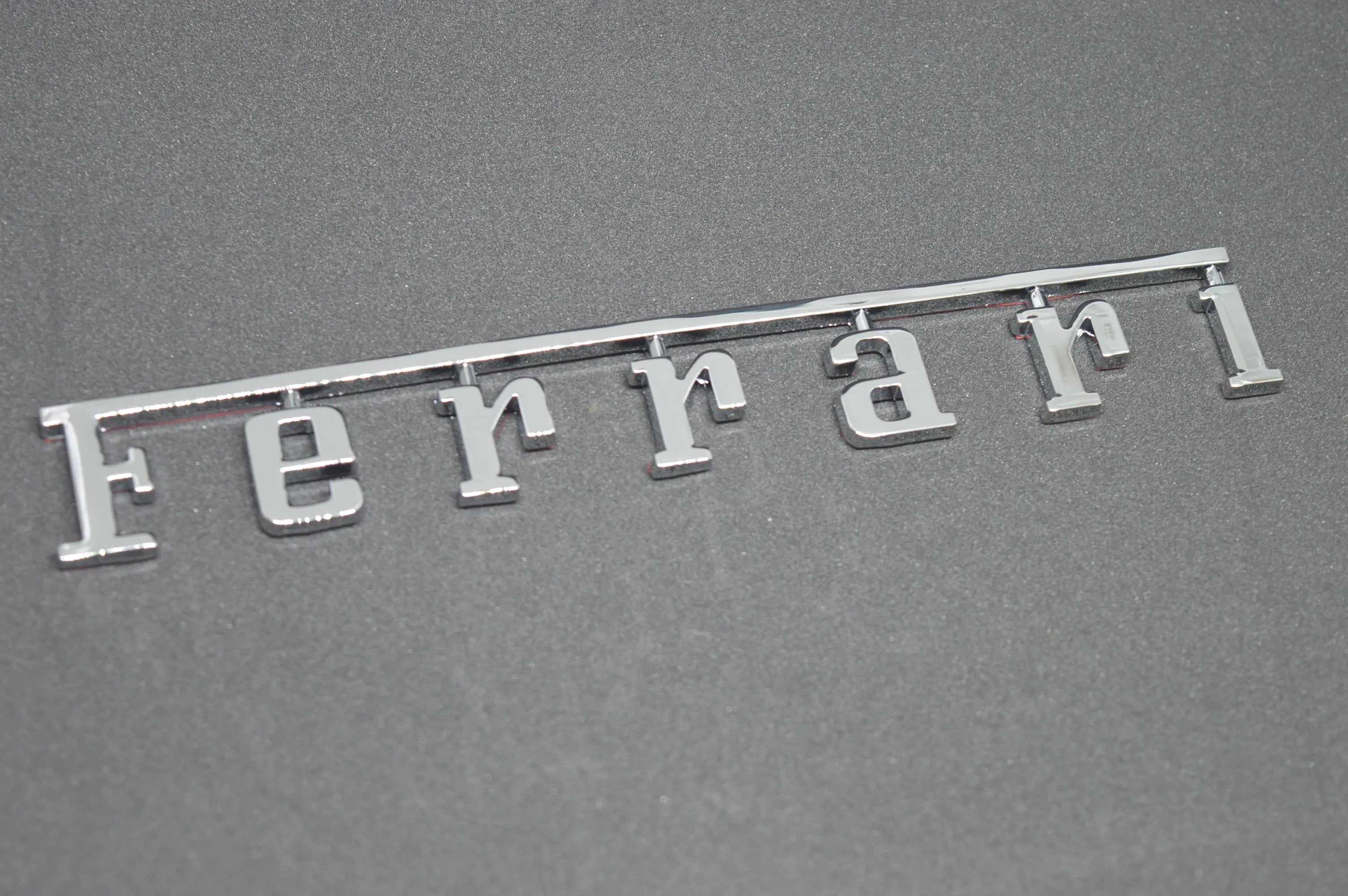 Ferrari Rear Badge Emblem Chrome Silver (Fits Many 20cm*2.78cm ) Italiaspares