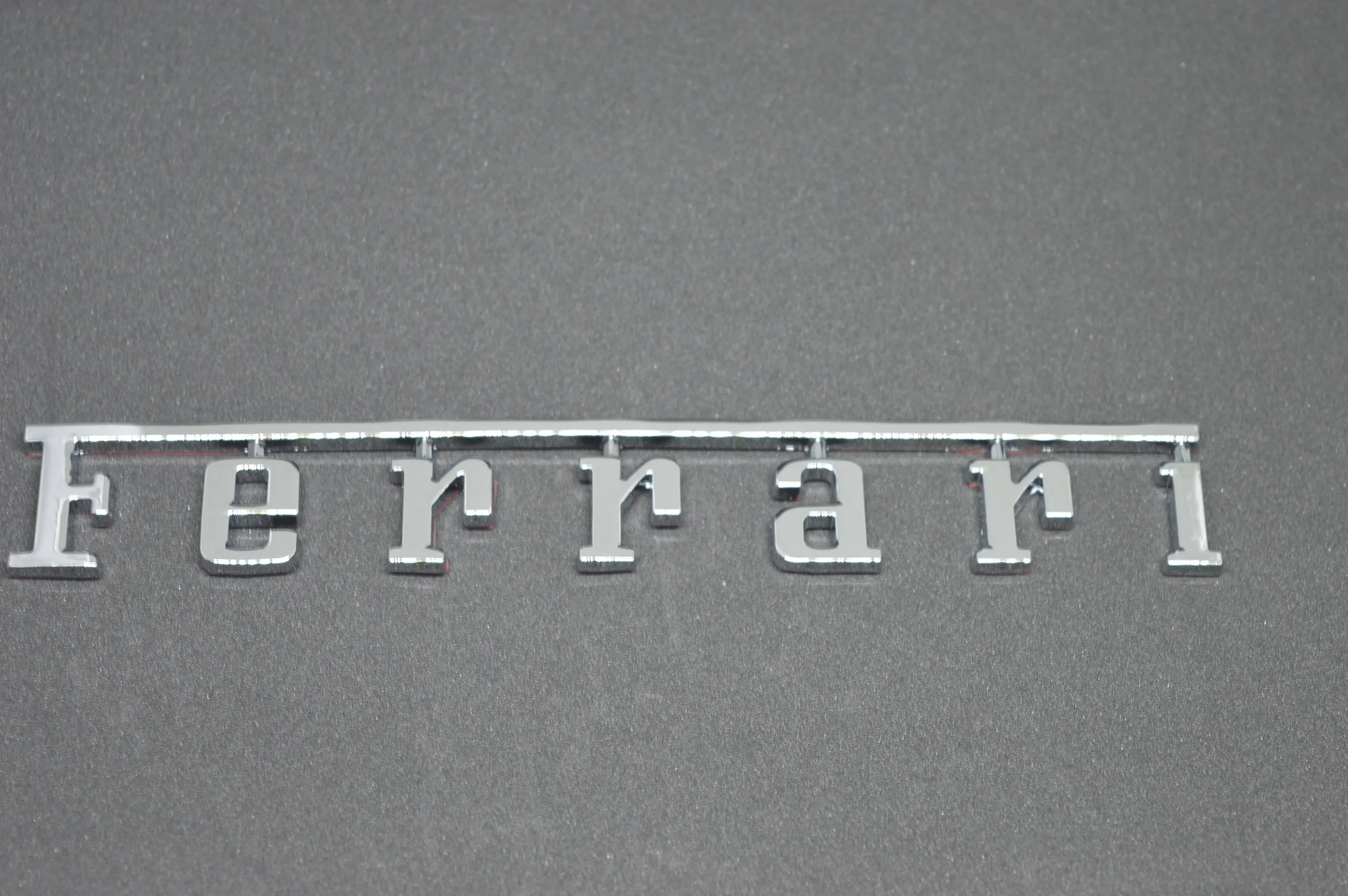 Ferrari Rear Badge Emblem Chrome Silver (Fits Many 20cm*2.78cm ) Italiaspares