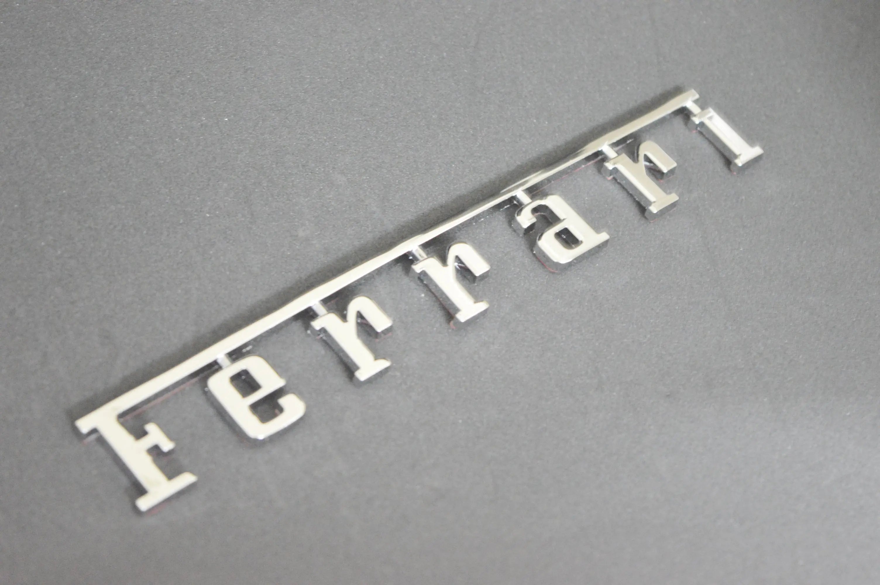 Ferrari Rear Badge Emblem Chrome Silver (Fits Many 20cm*2.78cm ) Italiaspares