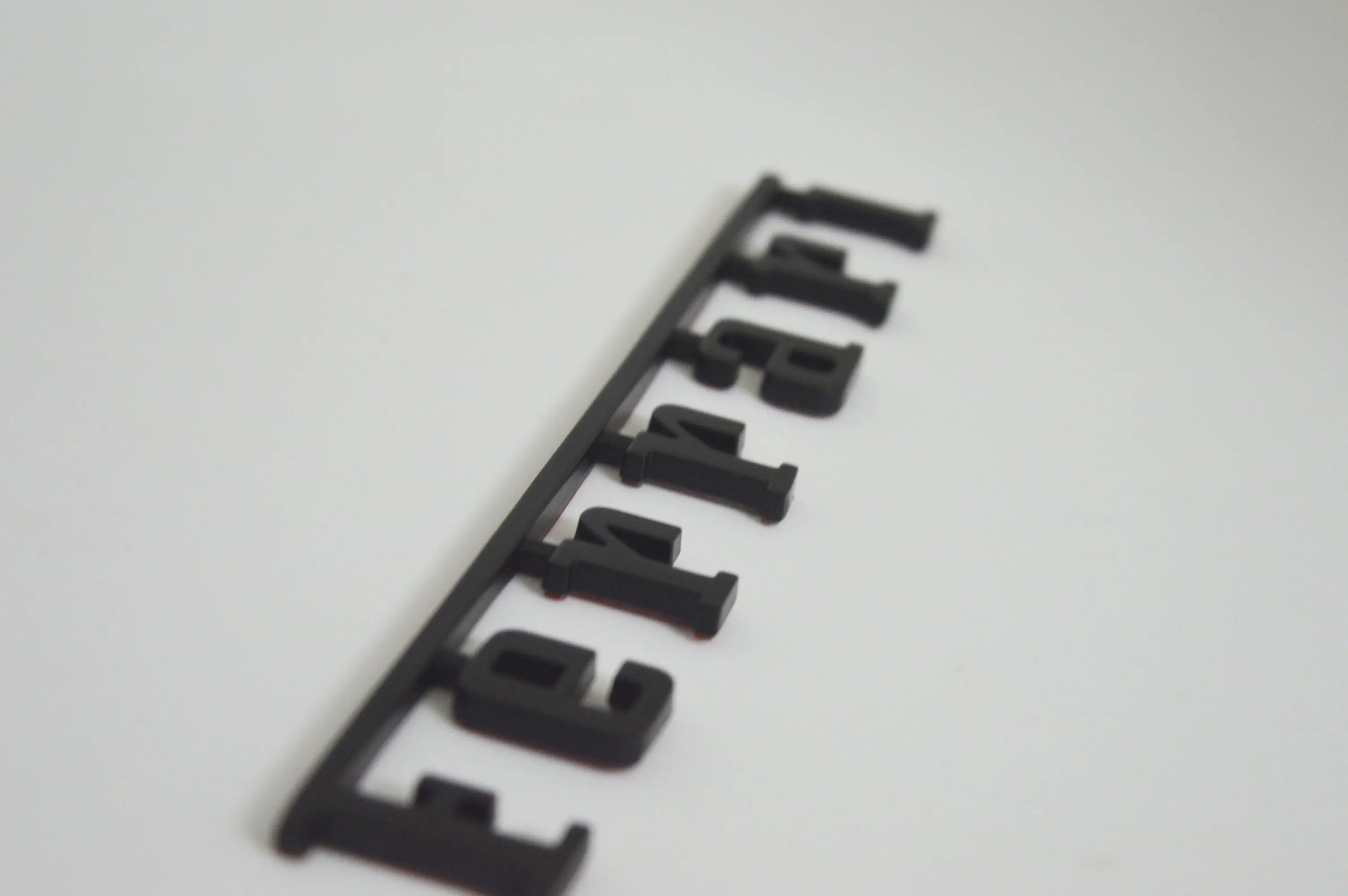 Ferrari Rear Badge Emblem Matte Black Italiaspares