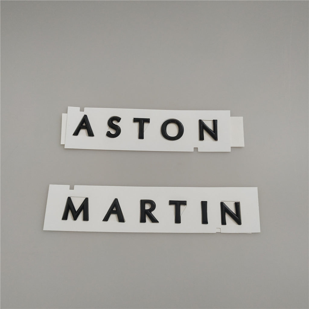 Aston Martin DBX Script Badge Rear Emblem Glossy Black MY83-001B40-CA Italiaspares
