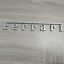 1xFerrari Manifold Badge Emblem Chrome Silver (15cm*2.05cm) Italiaspares