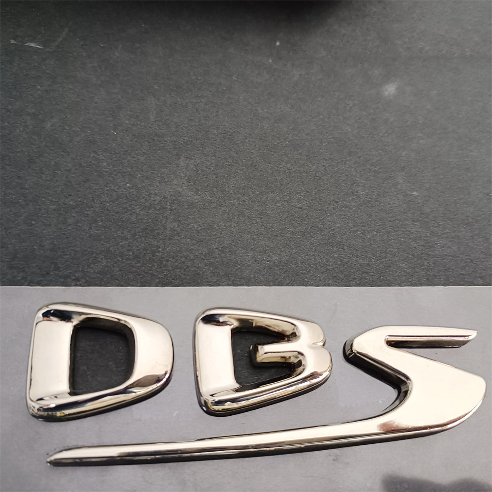 Aston Martin DBS Superleggera PASSENGER SIDE Side Silver Used Badge Factory
