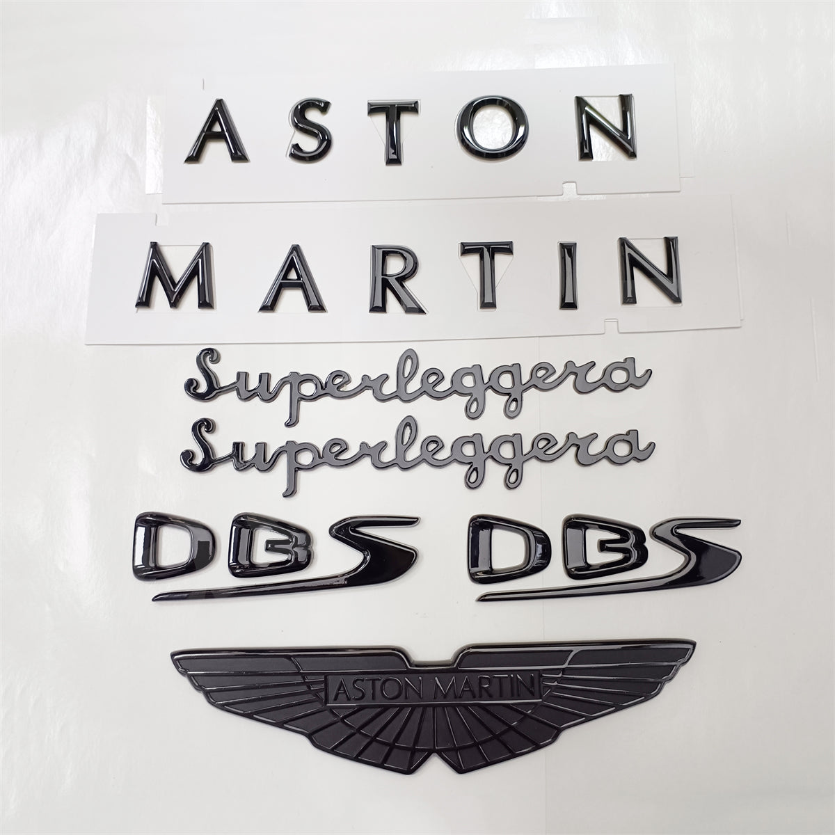 Aston Martin DBS Superleggera Gloss Black Chrome Badge Set - Black Emblem Factory