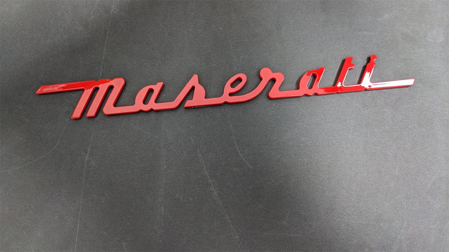 Maserati Quattroporte GranTurismo-Maserati Rear Emblems Script Gloss Red 673001404 Italiaspares