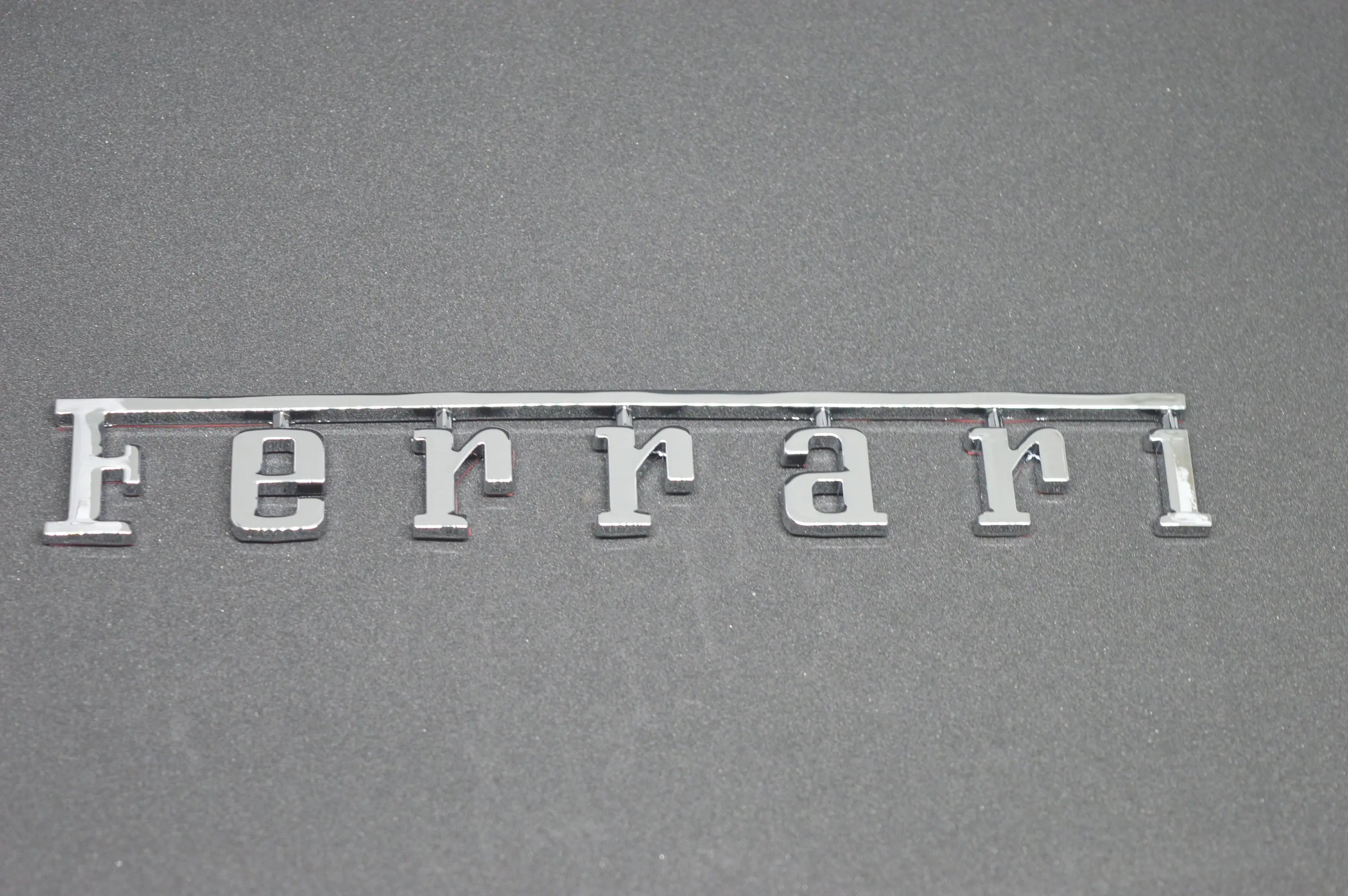 Ferrari Rear Badge Emblem Chrome Silver (Fits Many 20cm*2.78cm ) Italiaspares